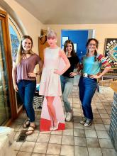 interns with Talor Swift carboard cutout